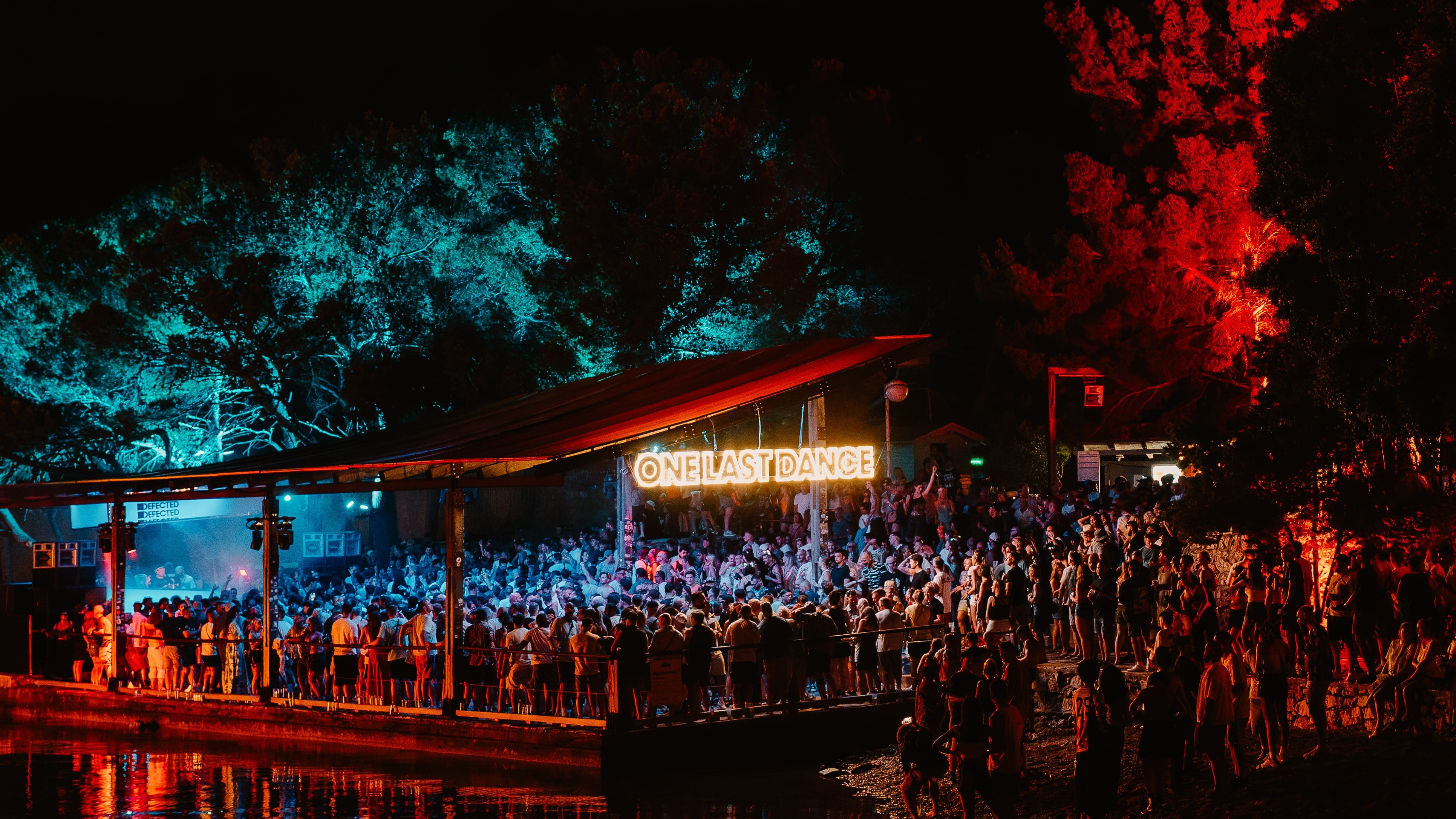 The ONE LAST DANCE neon above the dancefloor at Defected Croatia in The Garden Tisno